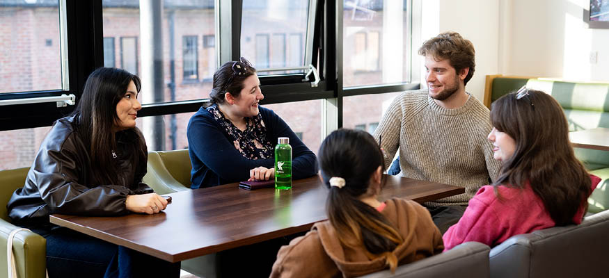 A group of students having a friendly discussion